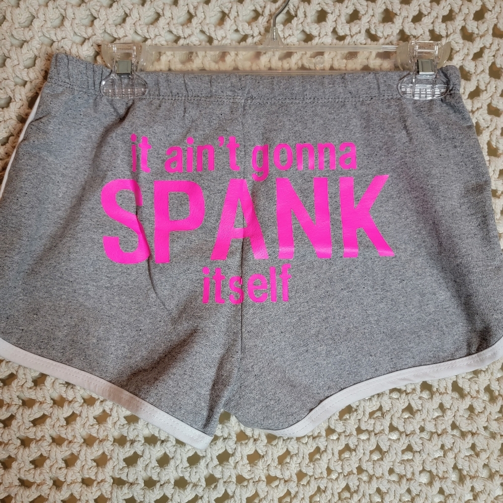 Shelor clothing ,brand new "it ain't going to Spank itself " sayin on back side.
